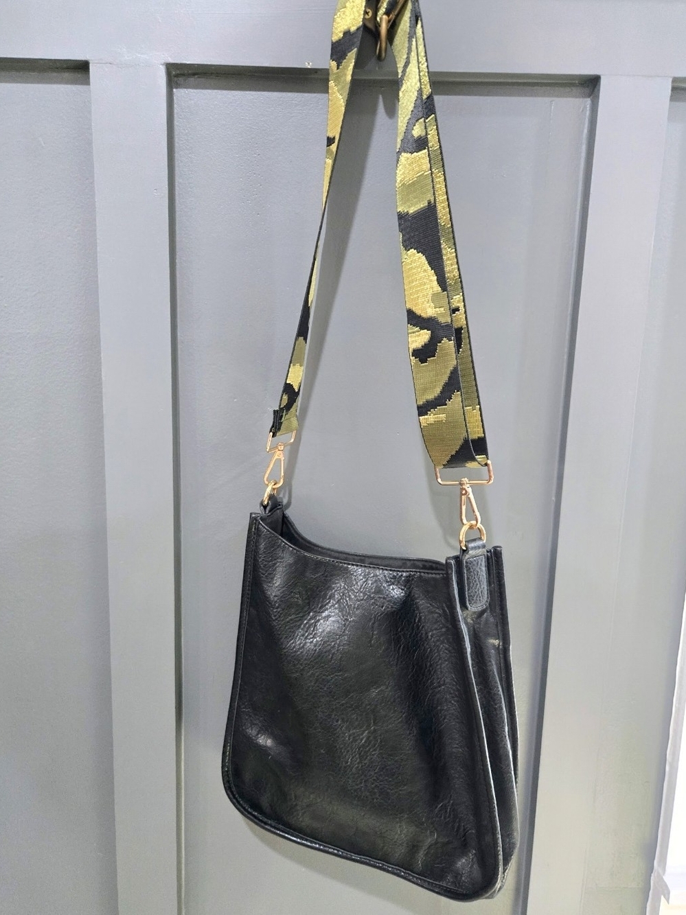 Stylish Black Handbag with Metallic Camo Strap - Excellent Condition